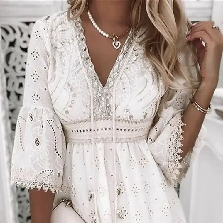 Back view of the Boho Mini Dress V-Neck Lace Bell Sleeves A-Line highlighting the flowing silhouette and lace trim