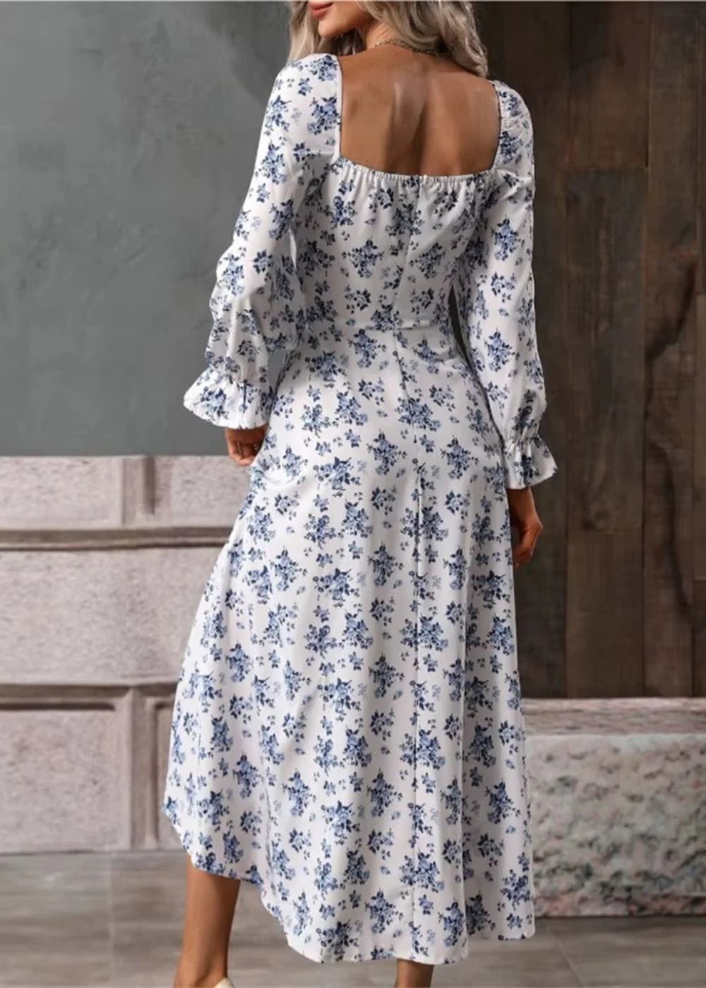 Close-up of floral square-neck dress showing empire waist and tie-front detail