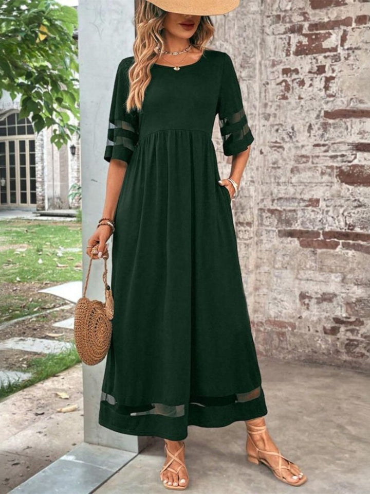 Side angle showing the relaxed A-line silhouette and ankle-length hem of the Women's Tummy Flattering Summer Dress