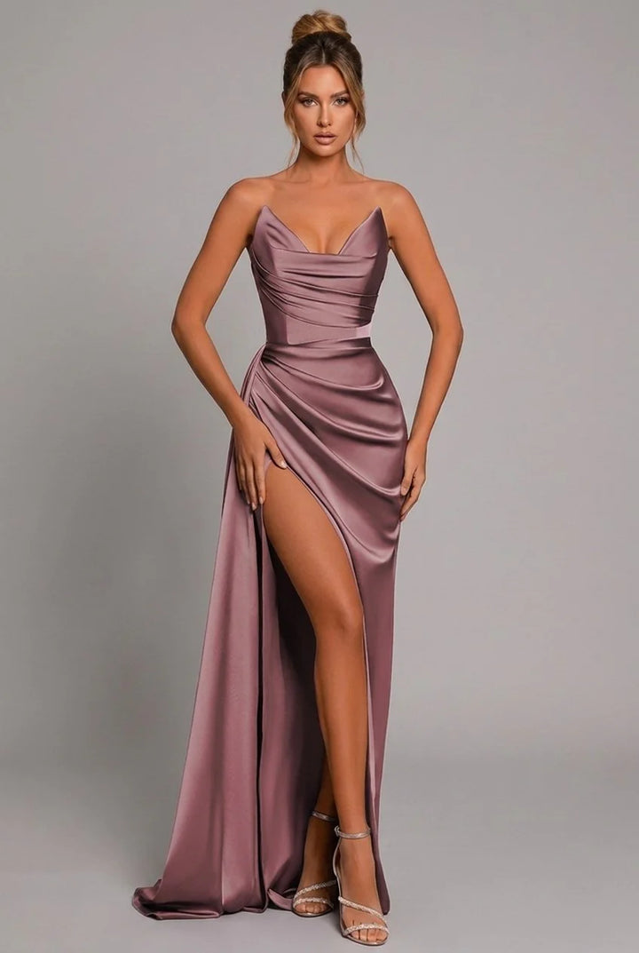 Burgundy maxi dress with fitted silhouette and high split detail for movement