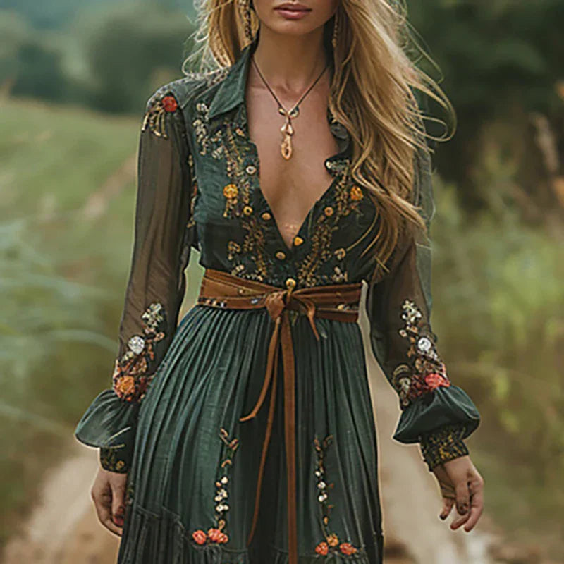 Close-up view of embroidered floral motifs and sheer long sleeves on Women's Floral Long Sleeve Maxi Dress