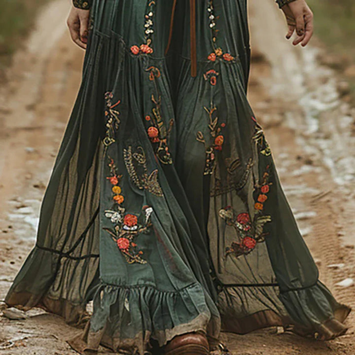 Side angle of Women's Floral Long Sleeve Maxi Dress showing V-neckline and detachable fabric belt at waist