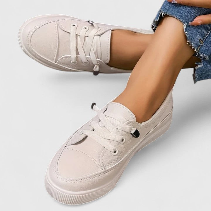 Close-up view of Women Casual Orthopedic Platform Sneakers showing minimalist upper and classic lacing detail