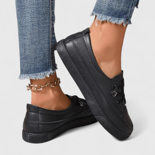 Side profile of platform trainers highlighting cushioned sole and supportive base for natural alignment