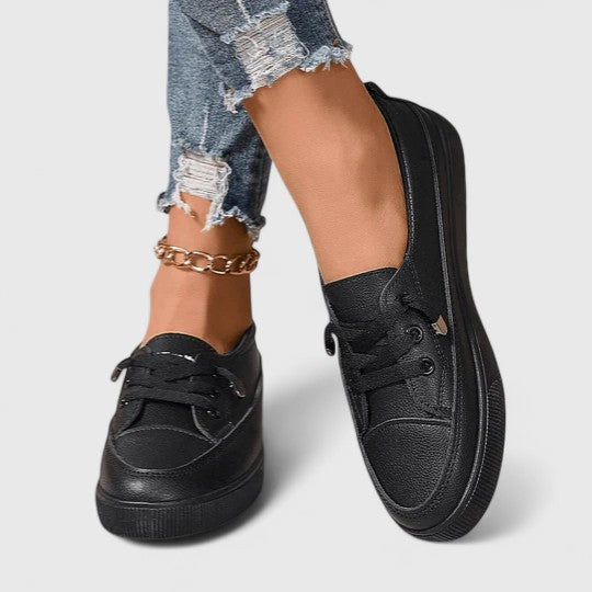 Platform trainers worn with casual separates demonstrating versatile everyday styling options