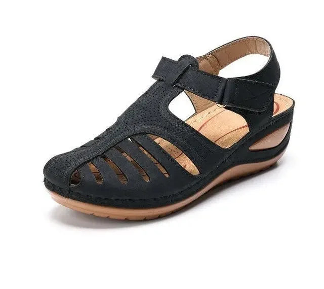 Women's orthopaedic sandals in black with closed-toe fisherman design and adjustable ankle strap for supportive comfort