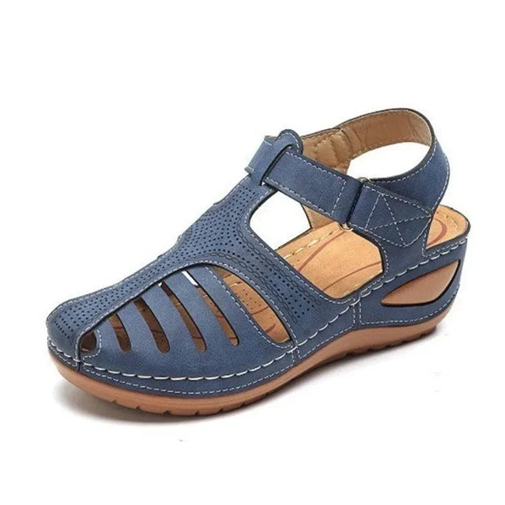 Close-up of adjustable hook-and-loop ankle strap on women's orthopaedic sandals with contoured footbed