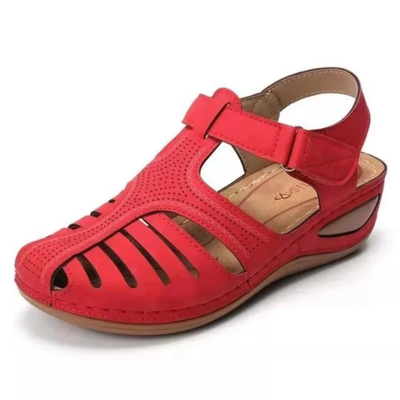 Women's orthopaedic sandals styled with casual attire showcasing closed-toe fisherman silhouette and arch support design