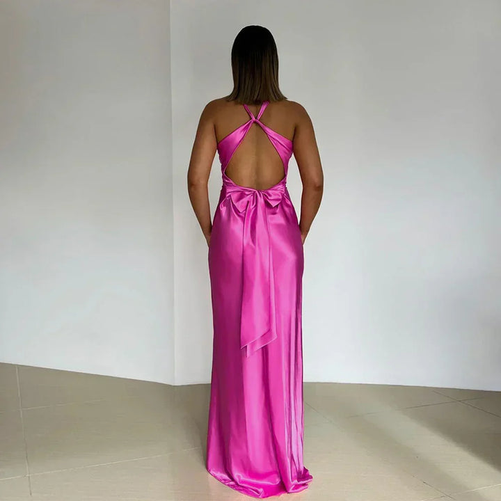 Detail shot of twisted crossover bust and smooth fabric finish on formal dress
