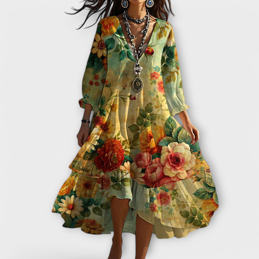 Women Vintage Boho V-Neck Summer Dress with vibrant floral print and tiered hem in flowing midi length