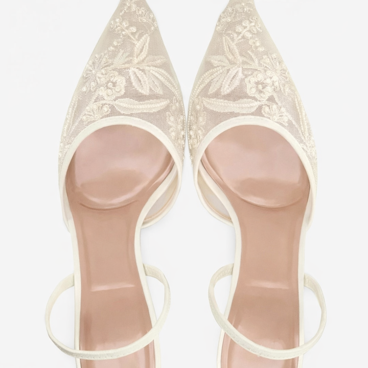 Side view of slingback mule heels with slim heel and mesh upper